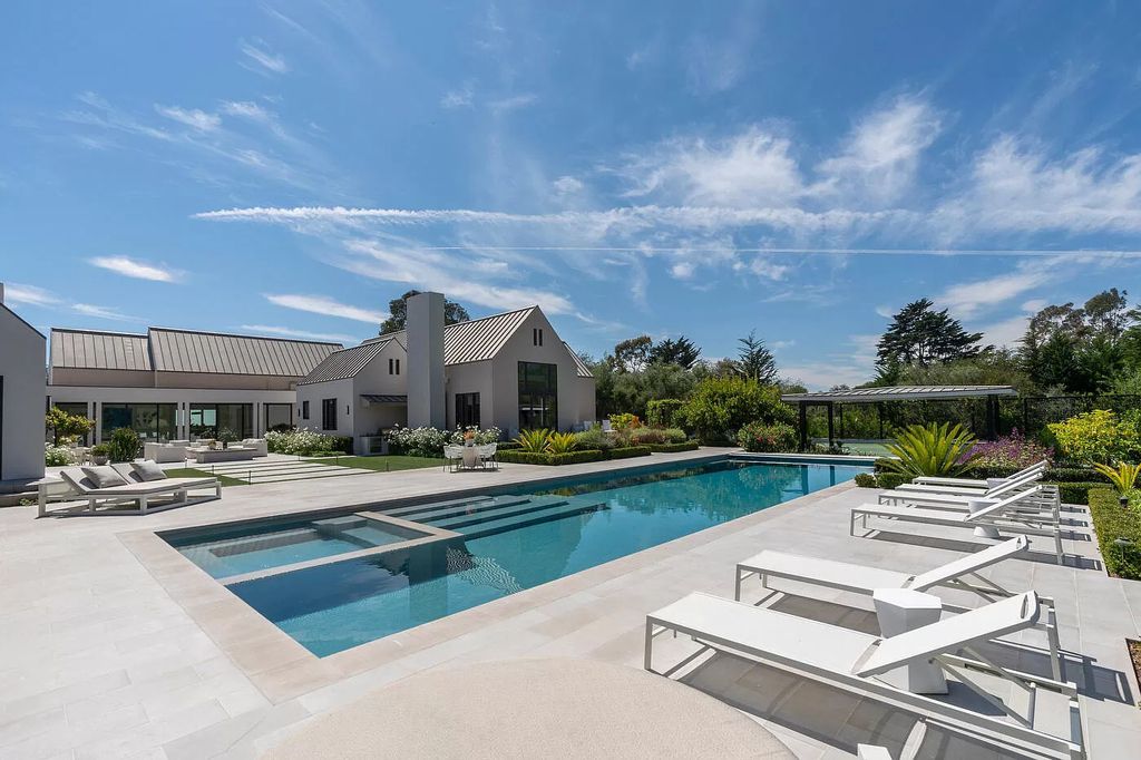 The Home in Santa Barbara is a stunning modern estate with newly constructed pool and spa, tennis court wit pavilion, vegetable gardens, firepit, stunning mountain, ocean and golf-course views now available for sale. This home located at 1850 Jelinda Dr, Santa Barbara, California