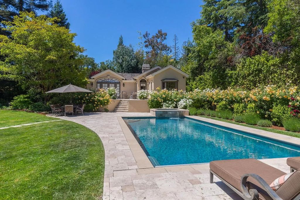The Home in Atherton is a prestigious estate are the beautifully landscaped grounds with the ultimate privacy down a long, gated driveway now available for sale. This home located at 23 Belbrook Way, Atherton, California