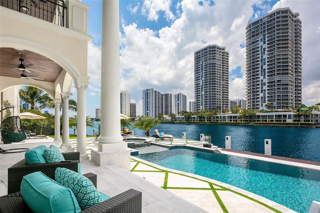 The Home in Golden Beach is an ultra-lavish waterfront palatial estate is set behind private gates at the end of a cul de sac now available for sale. This home located at 498 North Pkwy, Golden Beach, Florida