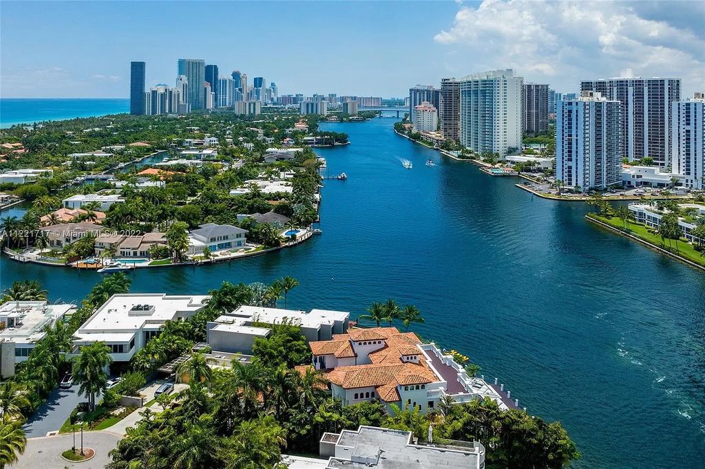 The Home in Golden Beach is an ultra-lavish waterfront palatial estate is set behind private gates at the end of a cul de sac now available for sale. This home located at 498 North Pkwy, Golden Beach, Florida