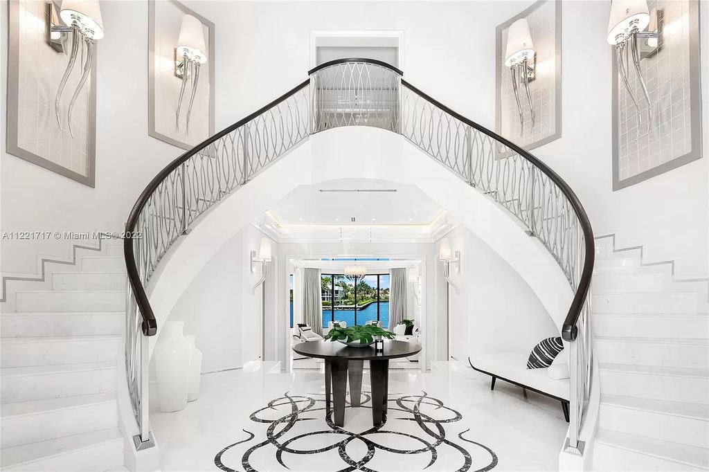 The Home in Golden Beach is an ultra-lavish waterfront palatial estate is set behind private gates at the end of a cul de sac now available for sale. This home located at 498 North Pkwy, Golden Beach, Florida
