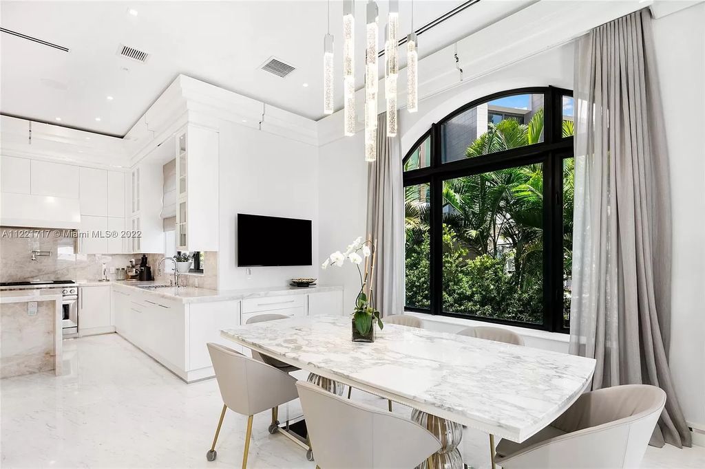The Home in Golden Beach is an ultra-lavish waterfront palatial estate is set behind private gates at the end of a cul de sac now available for sale. This home located at 498 North Pkwy, Golden Beach, Florida