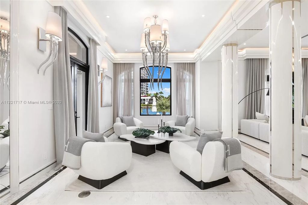 The Home in Golden Beach is an ultra-lavish waterfront palatial estate is set behind private gates at the end of a cul de sac now available for sale. This home located at 498 North Pkwy, Golden Beach, Florida