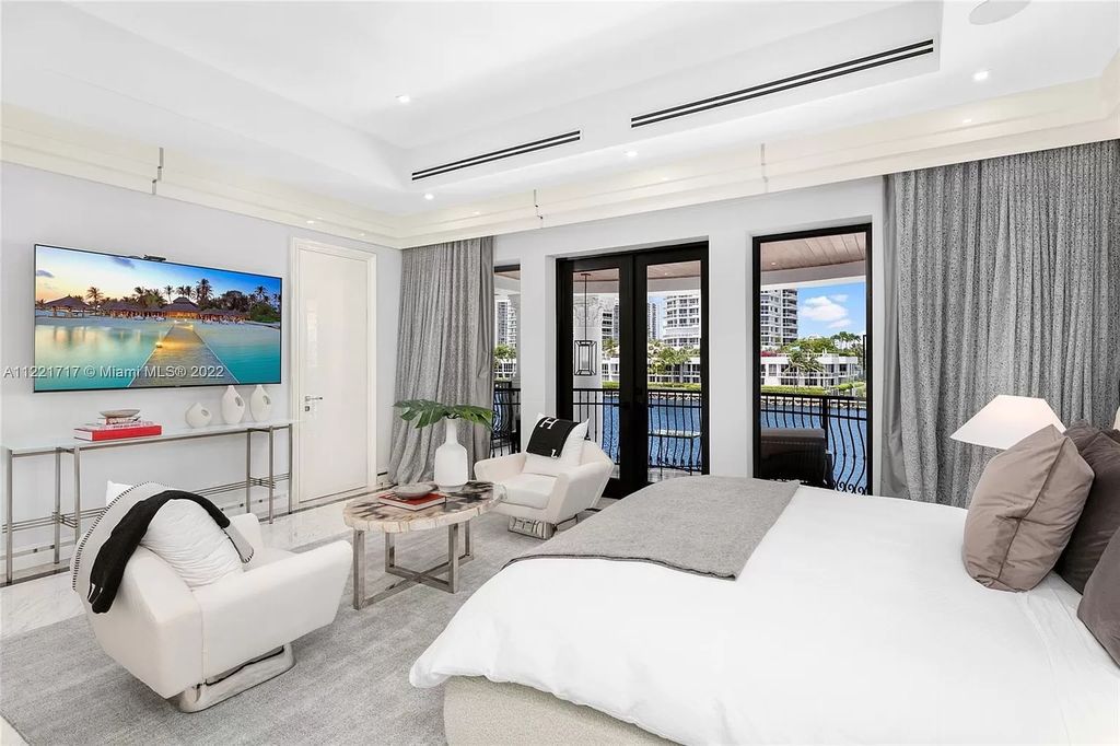 The Home in Golden Beach is an ultra-lavish waterfront palatial estate is set behind private gates at the end of a cul de sac now available for sale. This home located at 498 North Pkwy, Golden Beach, Florida