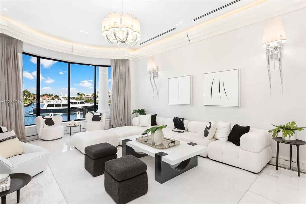 The Home in Golden Beach is an ultra-lavish waterfront palatial estate is set behind private gates at the end of a cul de sac now available for sale. This home located at 498 North Pkwy, Golden Beach, Florida