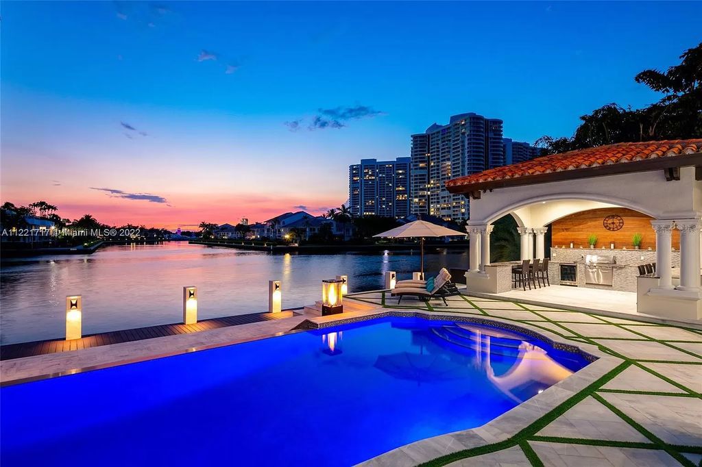 The Home in Golden Beach is an ultra-lavish waterfront palatial estate is set behind private gates at the end of a cul de sac now available for sale. This home located at 498 North Pkwy, Golden Beach, Florida