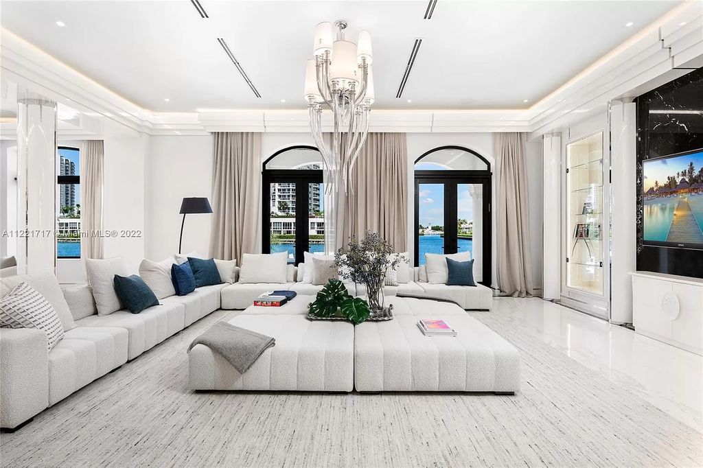 The Home in Golden Beach is an ultra-lavish waterfront palatial estate is set behind private gates at the end of a cul de sac now available for sale. This home located at 498 North Pkwy, Golden Beach, Florida