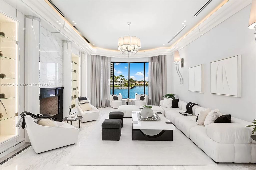 The Home in Golden Beach is an ultra-lavish waterfront palatial estate is set behind private gates at the end of a cul de sac now available for sale. This home located at 498 North Pkwy, Golden Beach, Florida