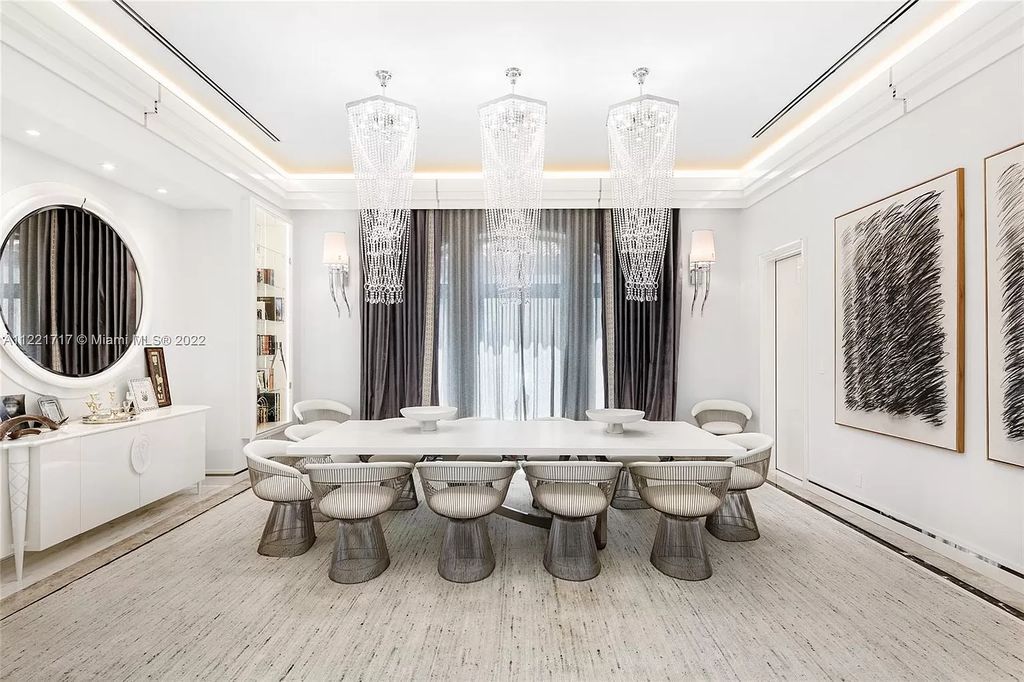 The Home in Golden Beach is an ultra-lavish waterfront palatial estate is set behind private gates at the end of a cul de sac now available for sale. This home located at 498 North Pkwy, Golden Beach, Florida