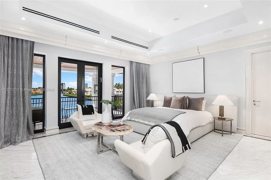 The Home in Golden Beach is an ultra-lavish waterfront palatial estate is set behind private gates at the end of a cul de sac now available for sale. This home located at 498 North Pkwy, Golden Beach, Florida