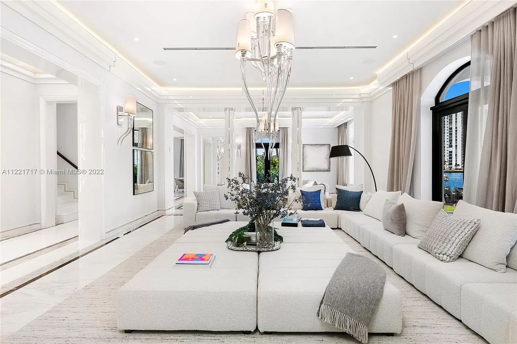 The Home in Golden Beach is an ultra-lavish waterfront palatial estate is set behind private gates at the end of a cul de sac now available for sale. This home located at 498 North Pkwy, Golden Beach, Florida