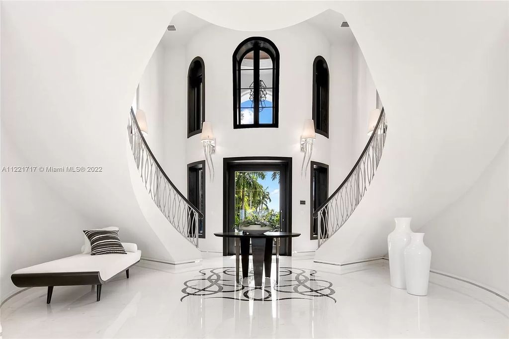The Home in Golden Beach is an ultra-lavish waterfront palatial estate is set behind private gates at the end of a cul de sac now available for sale. This home located at 498 North Pkwy, Golden Beach, Florida