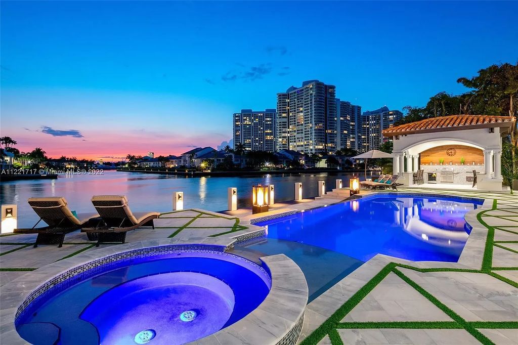 The Home in Golden Beach is an ultra-lavish waterfront palatial estate is set behind private gates at the end of a cul de sac now available for sale. This home located at 498 North Pkwy, Golden Beach, Florida