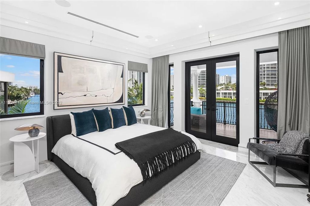 The Home in Golden Beach is an ultra-lavish waterfront palatial estate is set behind private gates at the end of a cul de sac now available for sale. This home located at 498 North Pkwy, Golden Beach, Florida