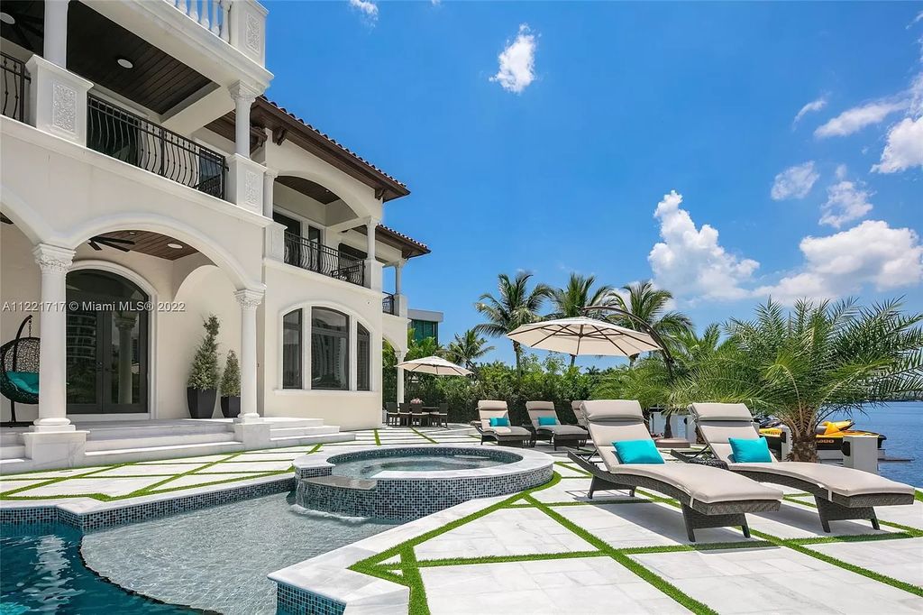 The Home in Golden Beach is an ultra-lavish waterfront palatial estate is set behind private gates at the end of a cul de sac now available for sale. This home located at 498 North Pkwy, Golden Beach, Florida