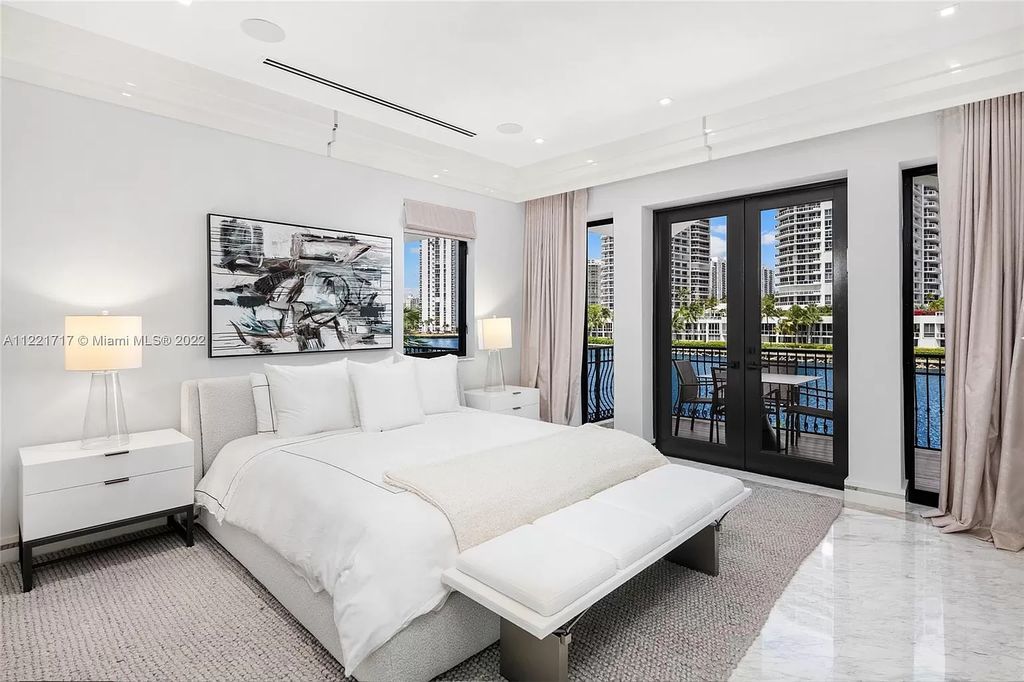 The Home in Golden Beach is an ultra-lavish waterfront palatial estate is set behind private gates at the end of a cul de sac now available for sale. This home located at 498 North Pkwy, Golden Beach, Florida