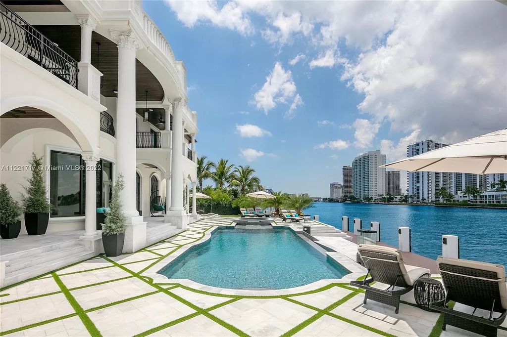 The Home in Golden Beach is an ultra-lavish waterfront palatial estate is set behind private gates at the end of a cul de sac now available for sale. This home located at 498 North Pkwy, Golden Beach, Florida