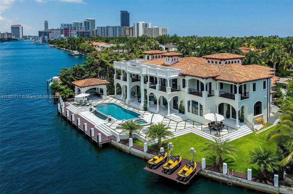 The Home in Golden Beach is an ultra-lavish waterfront palatial estate is set behind private gates at the end of a cul de sac now available for sale. This home located at 498 North Pkwy, Golden Beach, Florida
