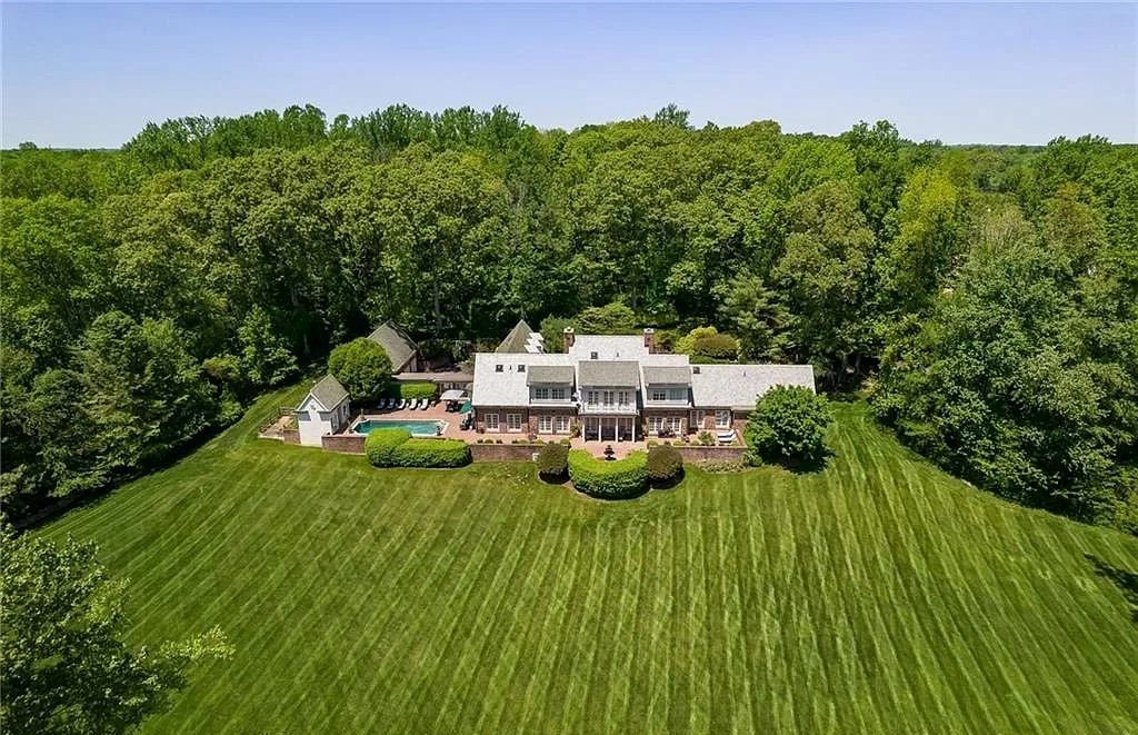 The Home in Connecticut is a luxurious home surrounded by perennial gardens, lush rolling lawns and gorgeous outdoor spaces now available for sale. This home located at 1194 Smith Ridge Rd, New Canaan, Connecticut; offering 05 bedrooms and 09 bathrooms with 8,623 square feet of living spaces.
