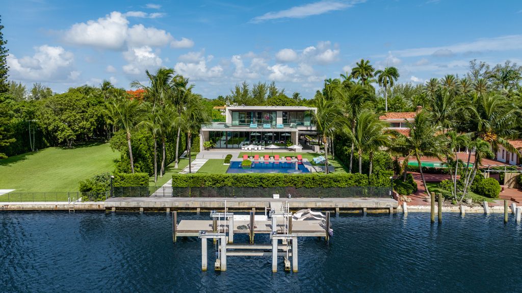 The Mansion in Miami Beach is a luxurious retreat-inspired custom built residence provides a zen ambiance with floating orchid gardens now available for sale. This home located at 4395 Pine Tree Dr, Miami Beach, Florida