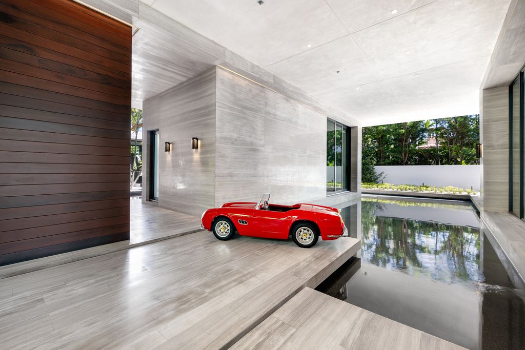The Mansion in Miami Beach is a luxurious retreat-inspired custom built residence provides a zen ambiance with floating orchid gardens now available for sale. This home located at 4395 Pine Tree Dr, Miami Beach, Florida