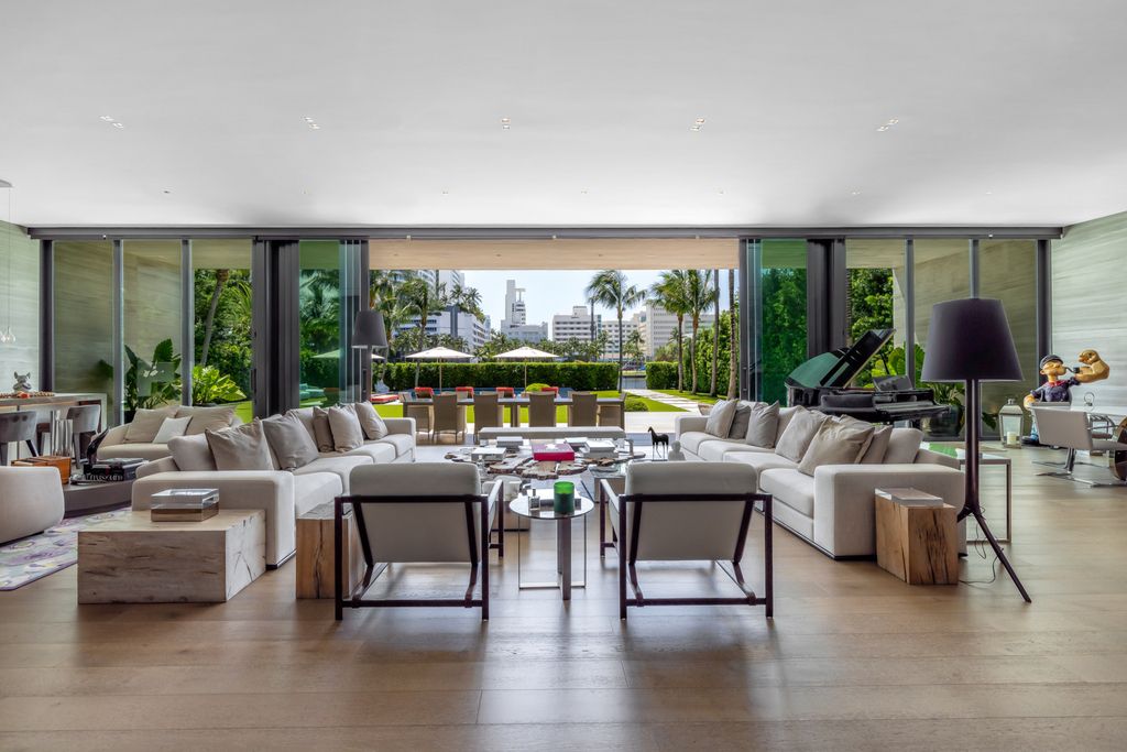 The Mansion in Miami Beach is a luxurious retreat-inspired custom built residence provides a zen ambiance with floating orchid gardens now available for sale. This home located at 4395 Pine Tree Dr, Miami Beach, Florida
