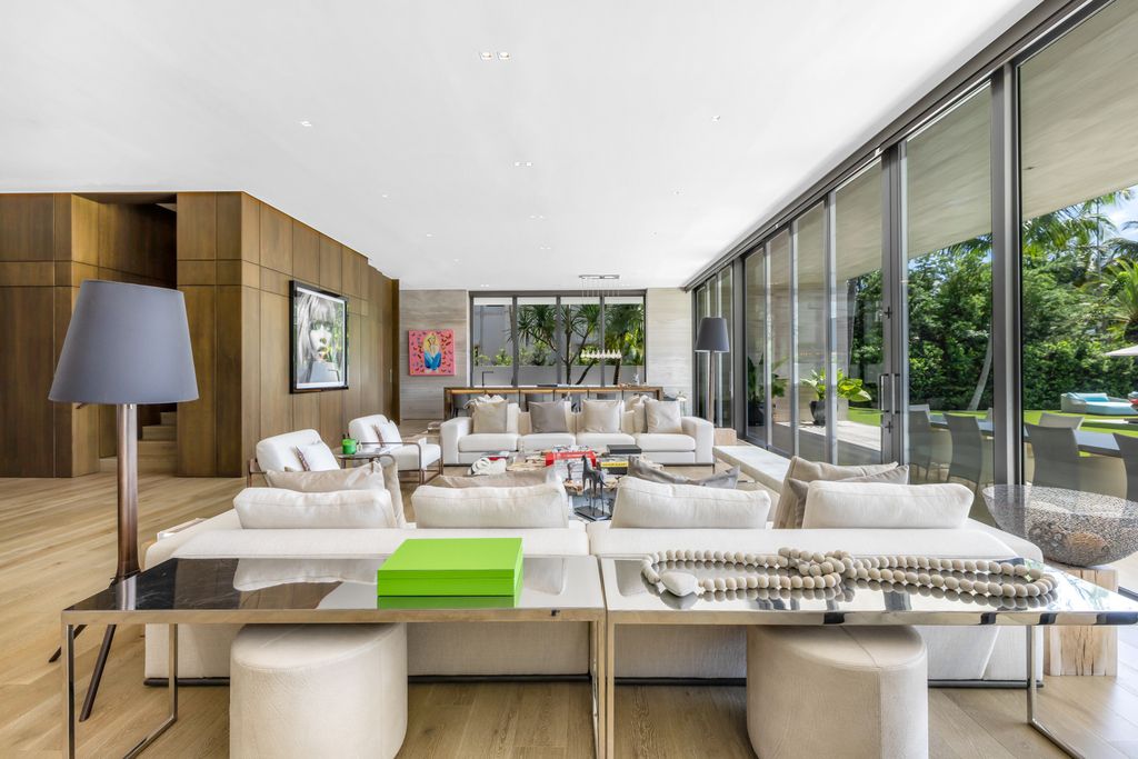 The Mansion in Miami Beach is a luxurious retreat-inspired custom built residence provides a zen ambiance with floating orchid gardens now available for sale. This home located at 4395 Pine Tree Dr, Miami Beach, Florida