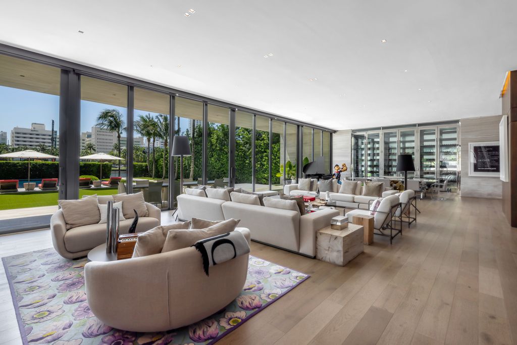 The Mansion in Miami Beach is a luxurious retreat-inspired custom built residence provides a zen ambiance with floating orchid gardens now available for sale. This home located at 4395 Pine Tree Dr, Miami Beach, Florida