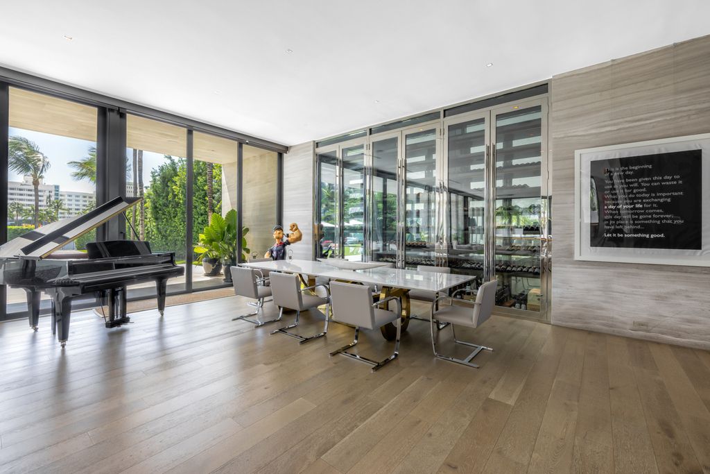 The Mansion in Miami Beach is a luxurious retreat-inspired custom built residence provides a zen ambiance with floating orchid gardens now available for sale. This home located at 4395 Pine Tree Dr, Miami Beach, Florida