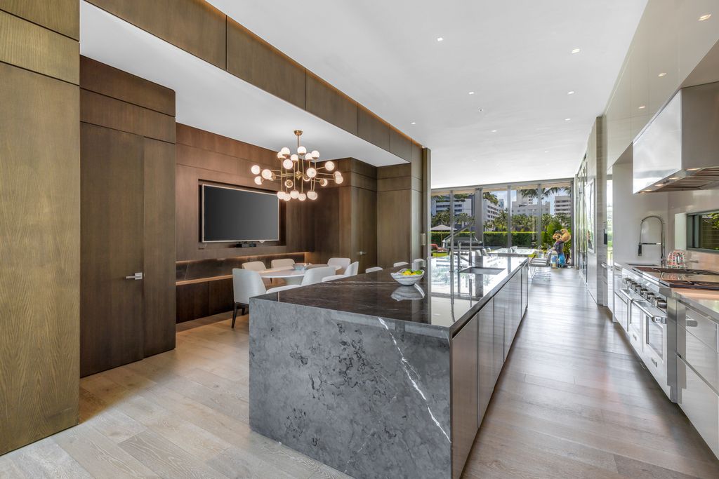 The Mansion in Miami Beach is a luxurious retreat-inspired custom built residence provides a zen ambiance with floating orchid gardens now available for sale. This home located at 4395 Pine Tree Dr, Miami Beach, Florida