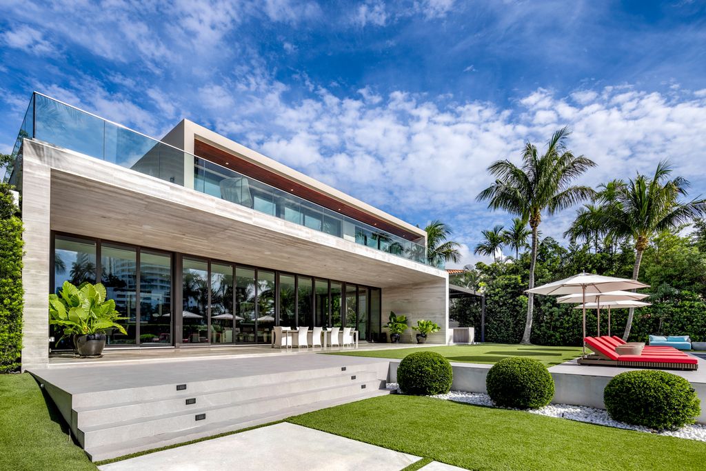 The Mansion in Miami Beach is a luxurious retreat-inspired custom built residence provides a zen ambiance with floating orchid gardens now available for sale. This home located at 4395 Pine Tree Dr, Miami Beach, Florida
