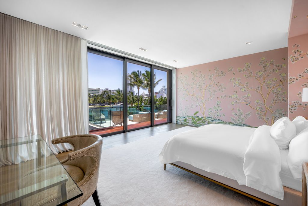 The Mansion in Miami Beach is a luxurious retreat-inspired custom built residence provides a zen ambiance with floating orchid gardens now available for sale. This home located at 4395 Pine Tree Dr, Miami Beach, Florida