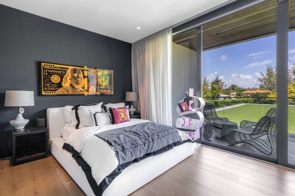 The Mansion in Miami Beach is a luxurious retreat-inspired custom built residence provides a zen ambiance with floating orchid gardens now available for sale. This home located at 4395 Pine Tree Dr, Miami Beach, Florida
