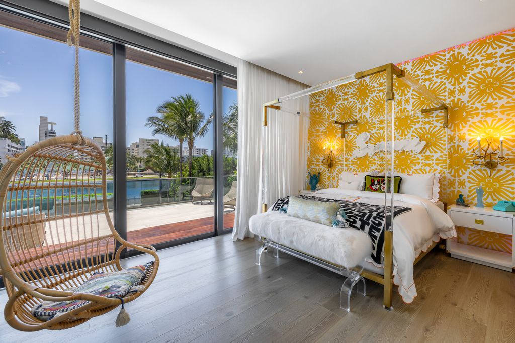 The Mansion in Miami Beach is a luxurious retreat-inspired custom built residence provides a zen ambiance with floating orchid gardens now available for sale. This home located at 4395 Pine Tree Dr, Miami Beach, Florida