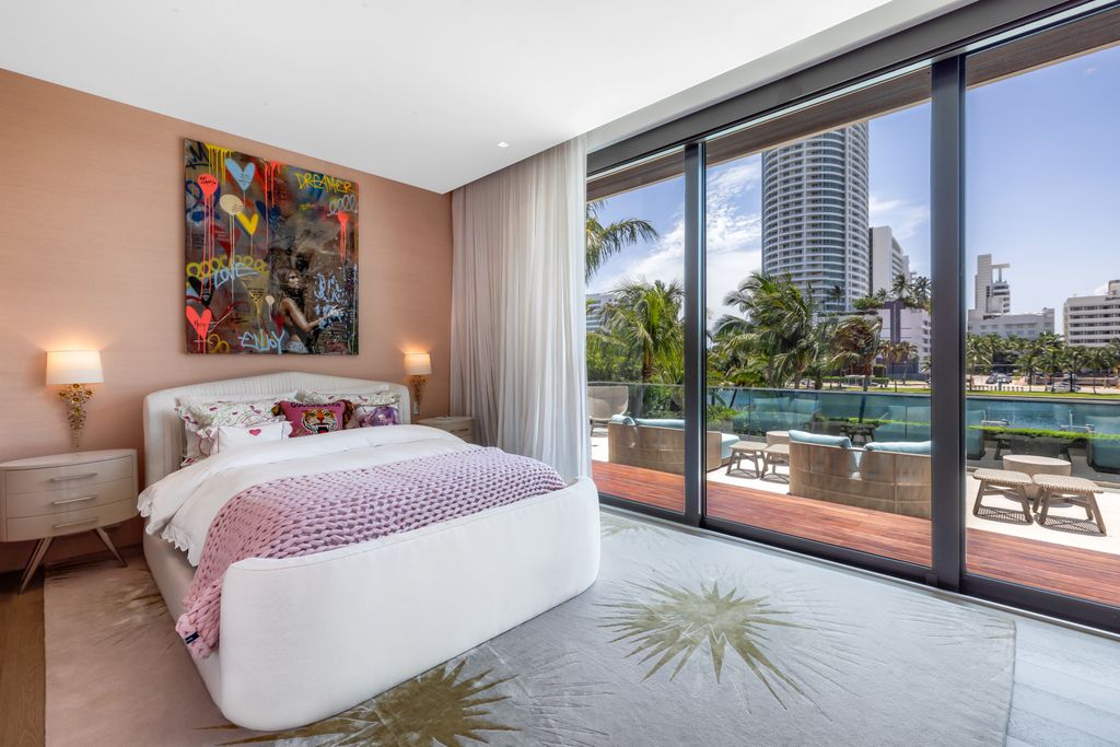 The Mansion in Miami Beach is a luxurious retreat-inspired custom built residence provides a zen ambiance with floating orchid gardens now available for sale. This home located at 4395 Pine Tree Dr, Miami Beach, Florida