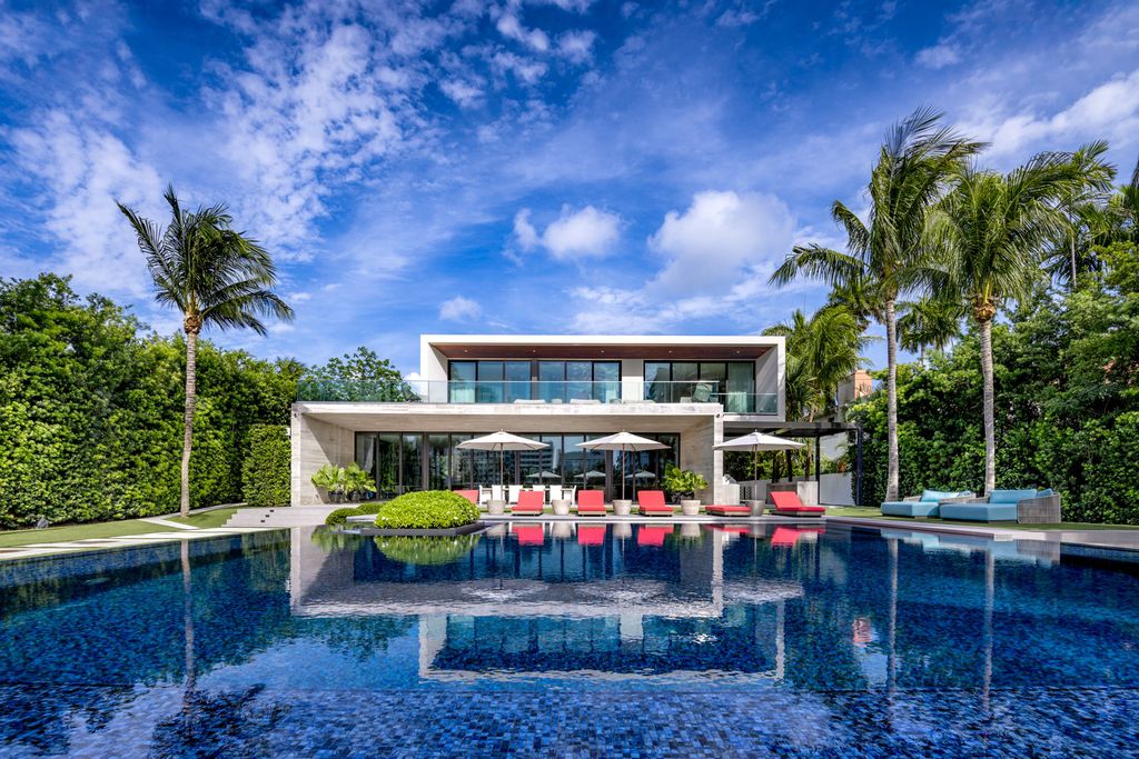 The Mansion in Miami Beach is a luxurious retreat-inspired custom built residence provides a zen ambiance with floating orchid gardens now available for sale. This home located at 4395 Pine Tree Dr, Miami Beach, Florida