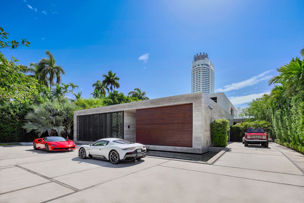 The Mansion in Miami Beach is a luxurious retreat-inspired custom built residence provides a zen ambiance with floating orchid gardens now available for sale. This home located at 4395 Pine Tree Dr, Miami Beach, Florida