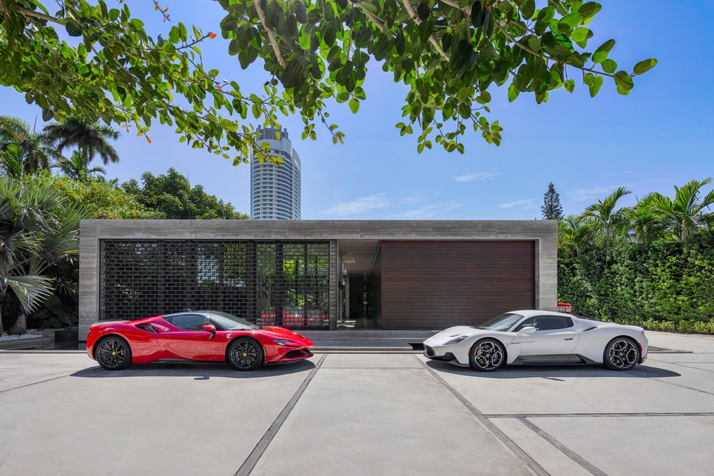 The Mansion in Miami Beach is a luxurious retreat-inspired custom built residence provides a zen ambiance with floating orchid gardens now available for sale. This home located at 4395 Pine Tree Dr, Miami Beach, Florida