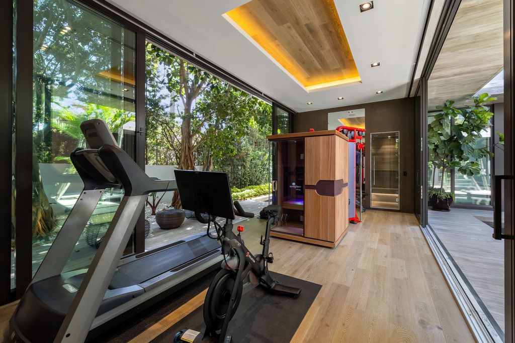The Mansion in Miami Beach is a luxurious retreat-inspired custom built residence provides a zen ambiance with floating orchid gardens now available for sale. This home located at 4395 Pine Tree Dr, Miami Beach, Florida