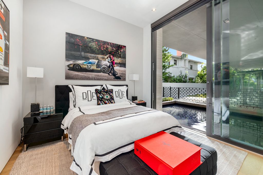 The Mansion in Miami Beach is a luxurious retreat-inspired custom built residence provides a zen ambiance with floating orchid gardens now available for sale. This home located at 4395 Pine Tree Dr, Miami Beach, Florida