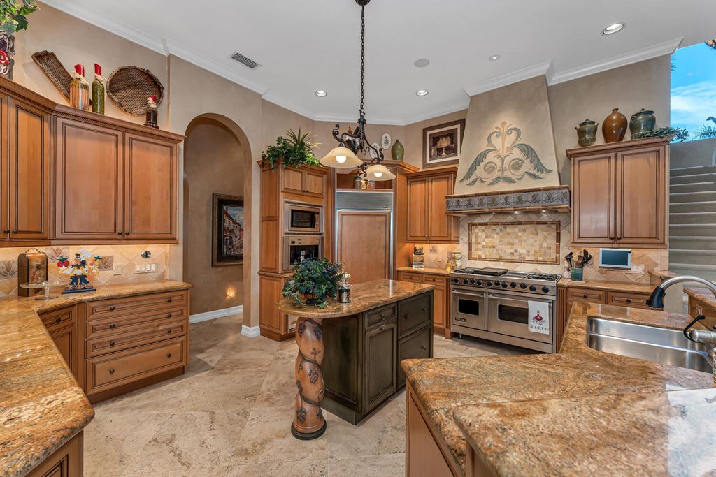 The Home in Naples is an exceptional custom home unlike any other in Watercrest with resort style outdoor area now available for sale. This home located at 2350 Cheshire Ln, Naples, Florida