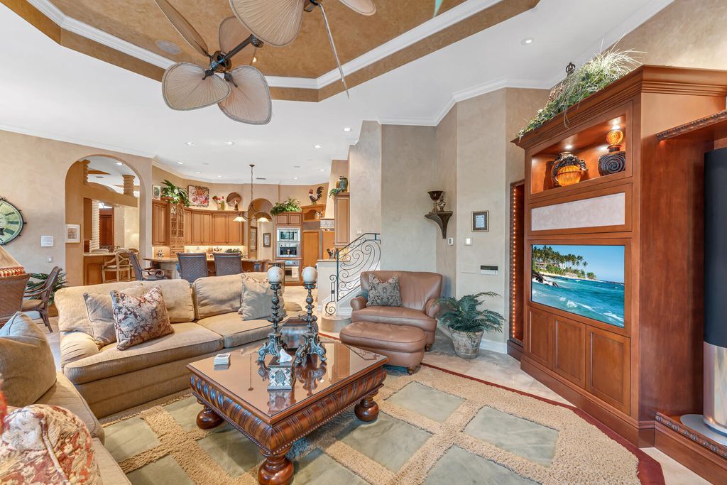 The Home in Naples is an exceptional custom home unlike any other in Watercrest with resort style outdoor area now available for sale. This home located at 2350 Cheshire Ln, Naples, Florida
