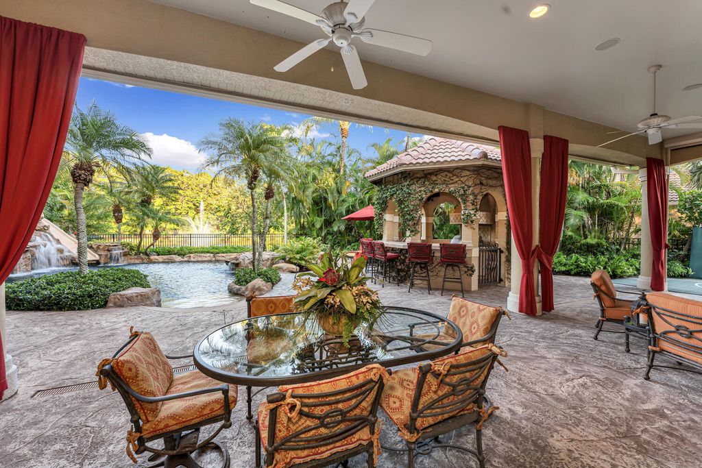 The Home in Naples is an exceptional custom home unlike any other in Watercrest with resort style outdoor area now available for sale. This home located at 2350 Cheshire Ln, Naples, Florida