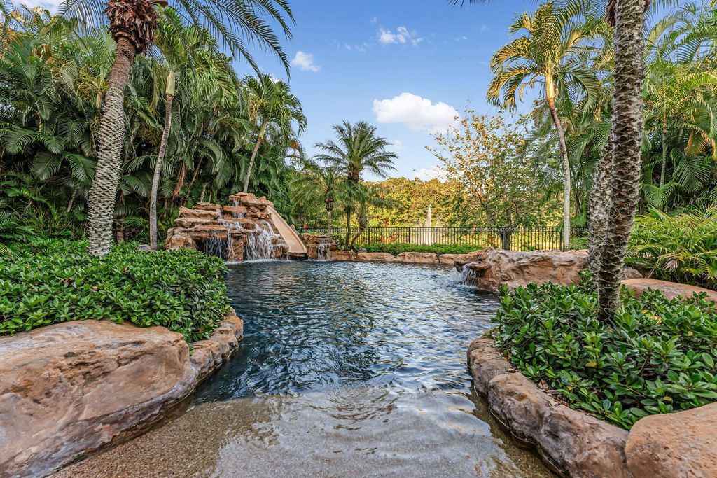 The Home in Naples is an exceptional custom home unlike any other in Watercrest with resort style outdoor area now available for sale. This home located at 2350 Cheshire Ln, Naples, Florida