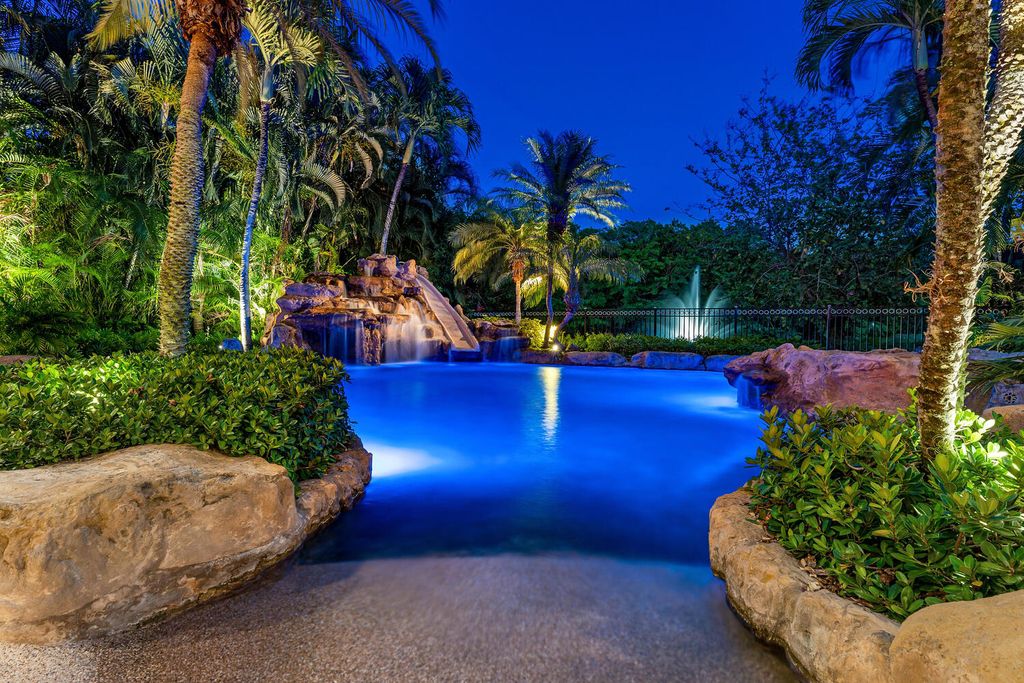 The Home in Naples is an exceptional custom home unlike any other in Watercrest with resort style outdoor area now available for sale. This home located at 2350 Cheshire Ln, Naples, Florida