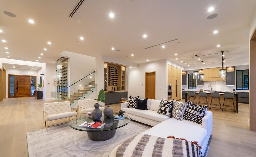 The Home in Encino is a masterfully crafted manor built with tasteful finishes and impeccable attention to detail now available for sale. This home located at 16739 Octavia Pl, Encino, California
