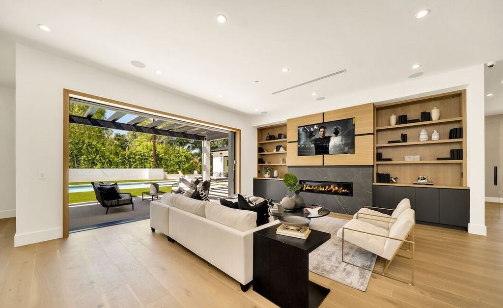 The Home in Encino is a masterfully crafted manor built with tasteful finishes and impeccable attention to detail now available for sale. This home located at 16739 Octavia Pl, Encino, California