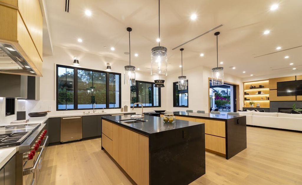 The Home in Encino is a masterfully crafted manor built with tasteful finishes and impeccable attention to detail now available for sale. This home located at 16739 Octavia Pl, Encino, California