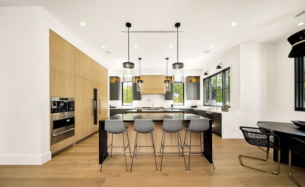 The Home in Encino is a masterfully crafted manor built with tasteful finishes and impeccable attention to detail now available for sale. This home located at 16739 Octavia Pl, Encino, California