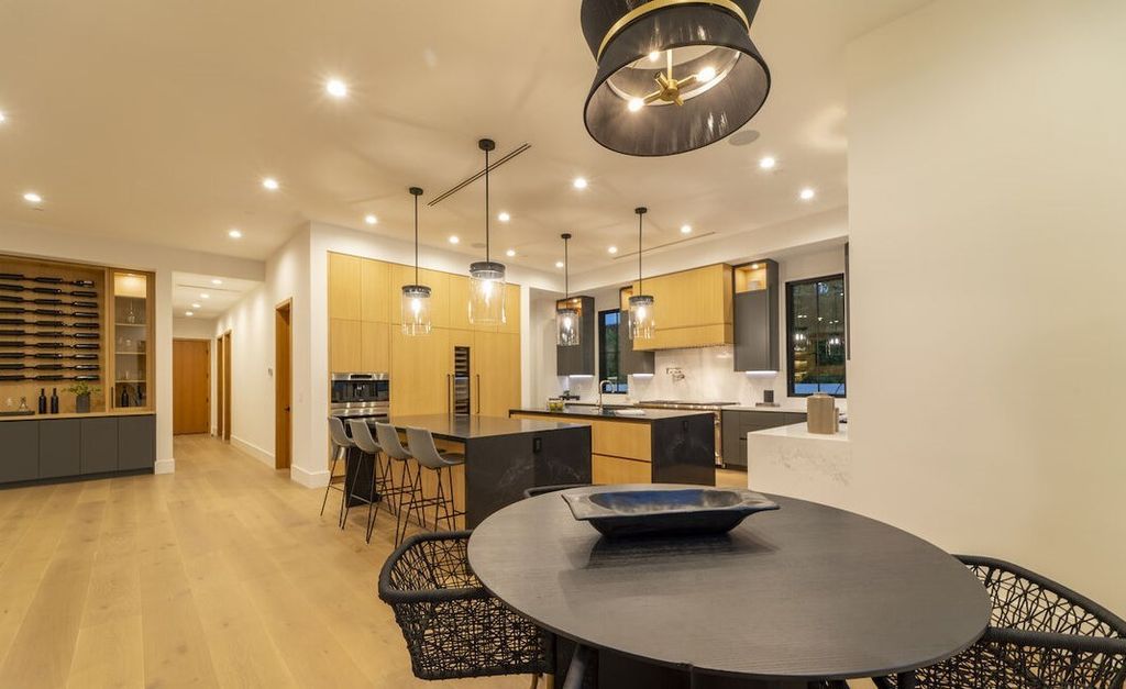 The Home in Encino is a masterfully crafted manor built with tasteful finishes and impeccable attention to detail now available for sale. This home located at 16739 Octavia Pl, Encino, California
